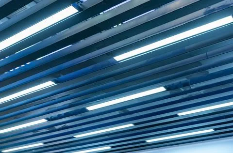 Lamps with diode lighting under the ceiling of a modern exhibition hall Stock Photos