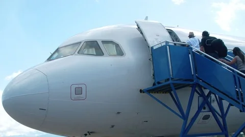 LAN Airplane. Passengers getting on the Plane Video stock 76415372