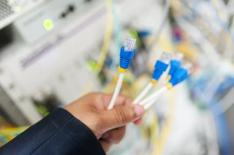 Lan cable in network room Stock Photos