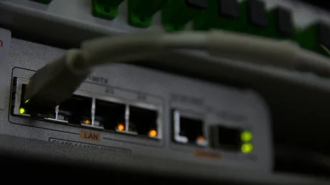 LAN TCP commutator at work. Low light, selective focus, high gain. Видео 111582625