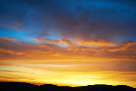 Land and dramatic sky Stock Photos