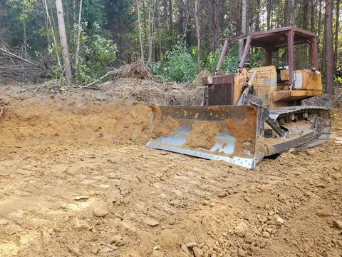 Land clearing with dozer Stock Photos