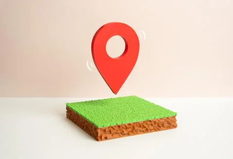 Land plot and geolocation marker. Investments in land holdings and cadastral  Stock Photos