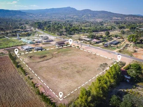 Land plot for building house aerial view, land field with pins, pin locatio.. Stock Photos