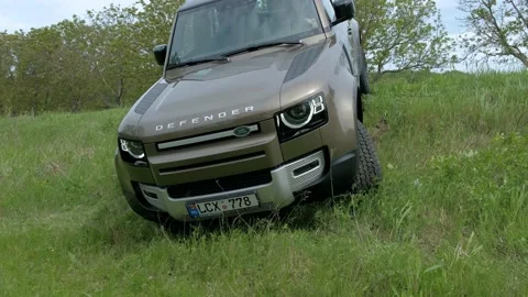 Land Rover Defender 2020 - Test drive highway. Elegant and brutal Britain SUV Stock Footage 131396331