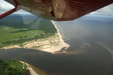 Land view from plane cabin Stock Photos