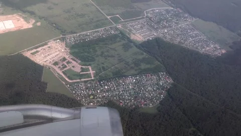 Land view through airplane window Video stock 248383330