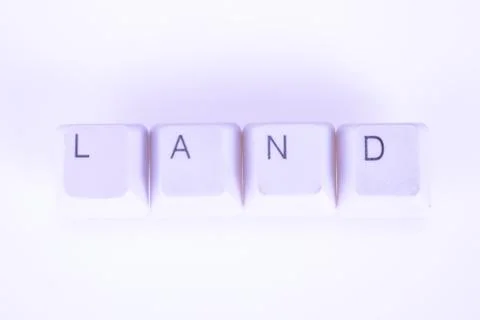 Land word written with computer buttons Foto stock