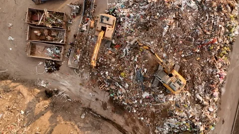 Landfill with Construction waste (CDW). Trash disposal for recycling and re-use. Stockbeeldmateriaal 218460709