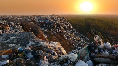 Landfill garbage dump at sunset Stock Footage 123296772