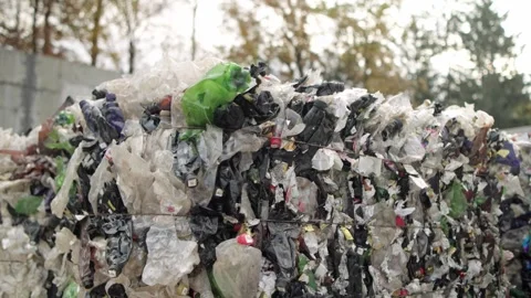 Landfill of pressed plastic bottles and their recycling. Ecology. Stock Footage 335688237
