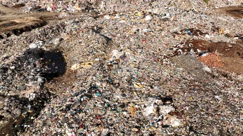 Landfill with rubbish disposal. Garbage dump with waste plastic Stockbeeldmateriaal 201745723