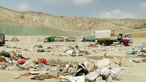 Landfill Scene With Garbage Trucks Unloading 4K 48FPS SLO-MO Stock Footage 201977811