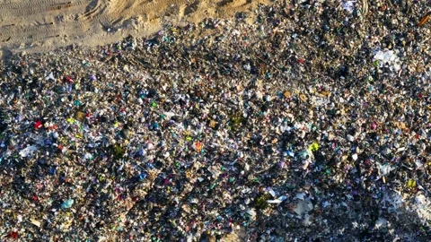 Landfill site displays extensive garbage pollution and toxic waste conditions Stock Footage 335195416