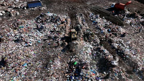Landfill with solid household waste. Garbage truck unloads rubbish Stock Footage 211441914