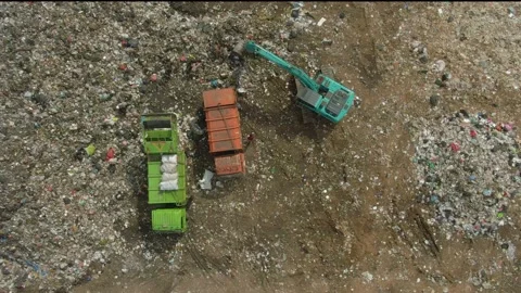 Landfill with solid household waste. Garbage truck unloads rubbish. Aerial view Video stock 219267763