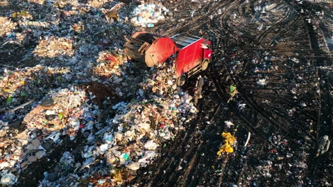 Landfill with solid household waste. Garbage dump with plastic and polyethylene. 動画素材 219834344