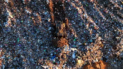 Landfill with solid household waste. Garbage dump with plastic and polyethylene. 動画素材 219834378