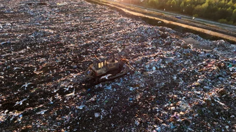 Landfill with solid household waste. Garbage dump with plastic and polyethylene. Stock Footage 219834490