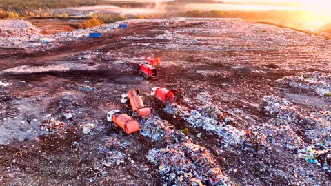 Landfill with solid household waste. Garbage dump with plastic and polyethylene. Stock Footage 219861083