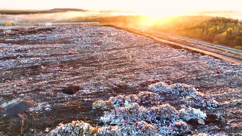 Landfill with solid household waste. Garbage dump with plastic and polyethylene. Stock Footage 219861086