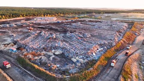 Landfill with solid household waste. Garbage dump with plastic and polyethylene. Stock Footage 219861123