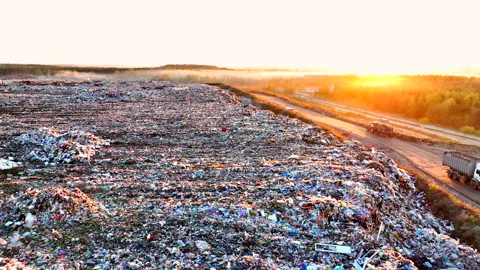 Landfill with solid household waste. Garbage dump with plastic and polyethylene. Stock Footage 219861771