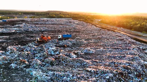 Landfill with solid household waste. Garbage dump with plastic and polyethylene. Stock Footage 219895315