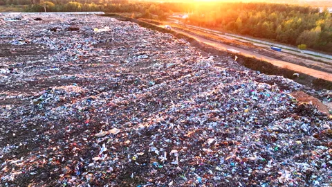 Landfill with solid household waste. Garbage dump with plastic and polyethylene. Stock Footage 219896758