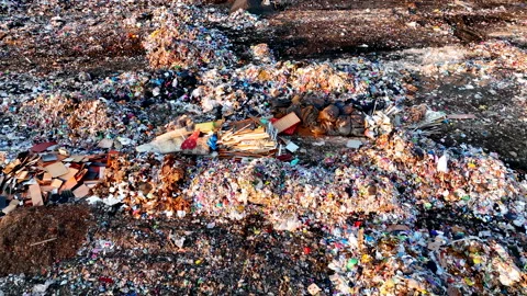 Landfill with storage of solid household waste. Rubbish in landfill. 動画素材 218265515