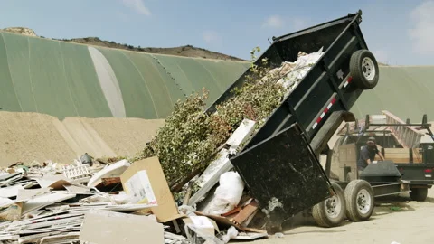 Landfill Trash Being Dumped From Trailer 4K 48FPS SLO-MO Stock Footage 201899476