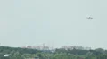 Landing airplane long shot. Approaching aircraft HD Footage