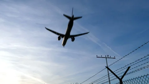Landing approach of an airplane Stock Footage 121590686