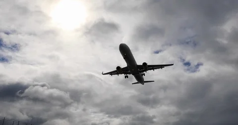 Landing in a cloudy sky Stock Footage 121675276