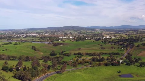 Landing down over Bega valley agriculture farms and diary pastures as 4k. Stock Footage 189623563