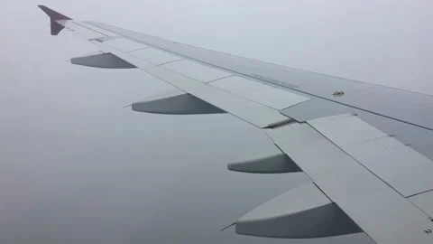 Landing during wind storm. View from the airplane window. Stock Footage 118726611