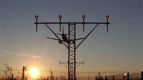 Landing lights and plane passing by during landing Video stock 45977893