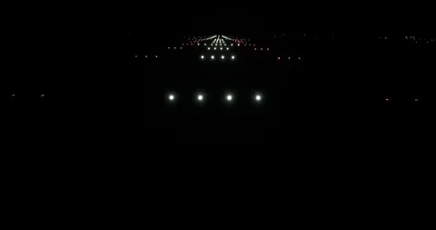 Landing lights at night Stock Footage 92426174
