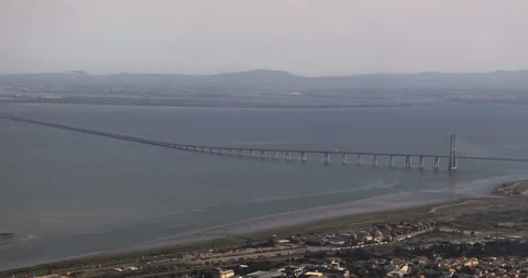 Landing in Lisbon, bridge in the background, 4K Stock Footage 221267351
