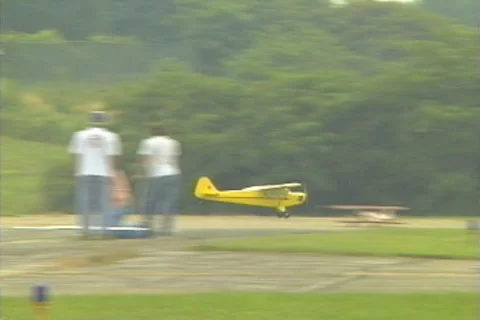 Landing a Model Remote Control Airplane Stock Footage 42222020