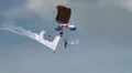 Landing Parachutist with big flag HD Footage