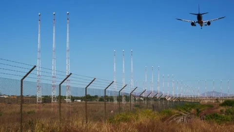 Landing plane approaching the runway Video stock 137444214
