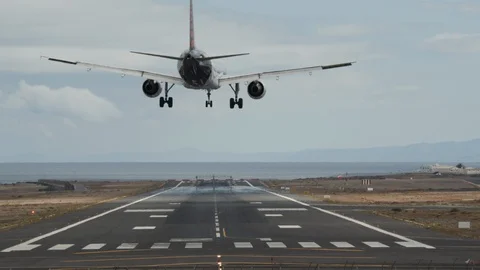 A landing plane from the back Stock Footage 115080658