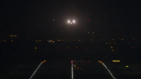 Landing on the runway at night Stock Footage 270147146