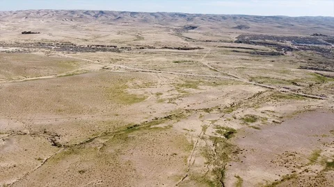 Landing from the sky to desert Stock Footage 129318866