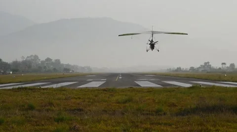 Landing of ultralight Stock Footage 62087077