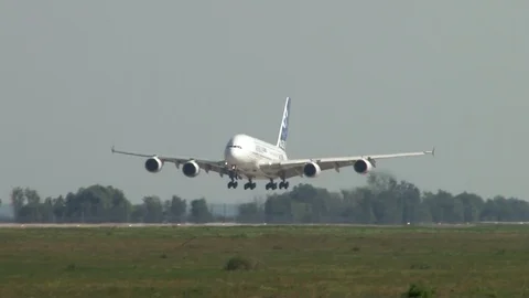 Landing wide-bodied two-story passenger Airbus A-380 on concrete runway. Stock Footage 106967732
