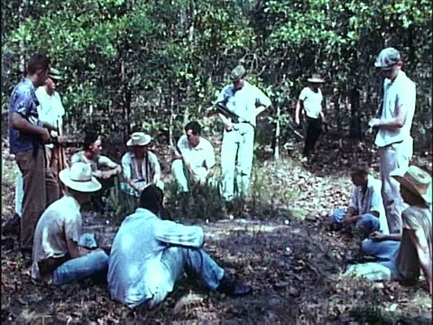 The Landing Zone for a runway is planned in a map made in the dirt, during the Stock Footage 79467898