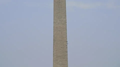 Landmark Monument with Plane Passing Stock Footage 311050085