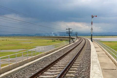 Landmark view, Railway line floating on water on the dam during low tide in S Stock Photos